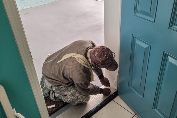 worker-opens-door-to-home-sweet-home-to-weather-st-2022-11-12-10-45-59-utc Weather seal and strip installation
